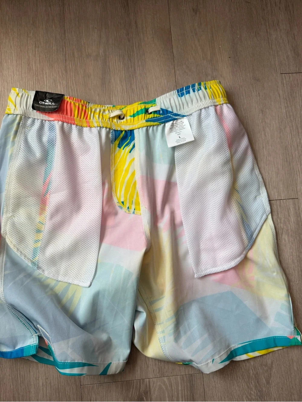 O'Neill youth Coral, Teal & Yellow Tropical Board Shorts